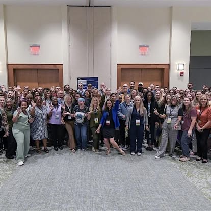 A large group gathered at an ICGH community event