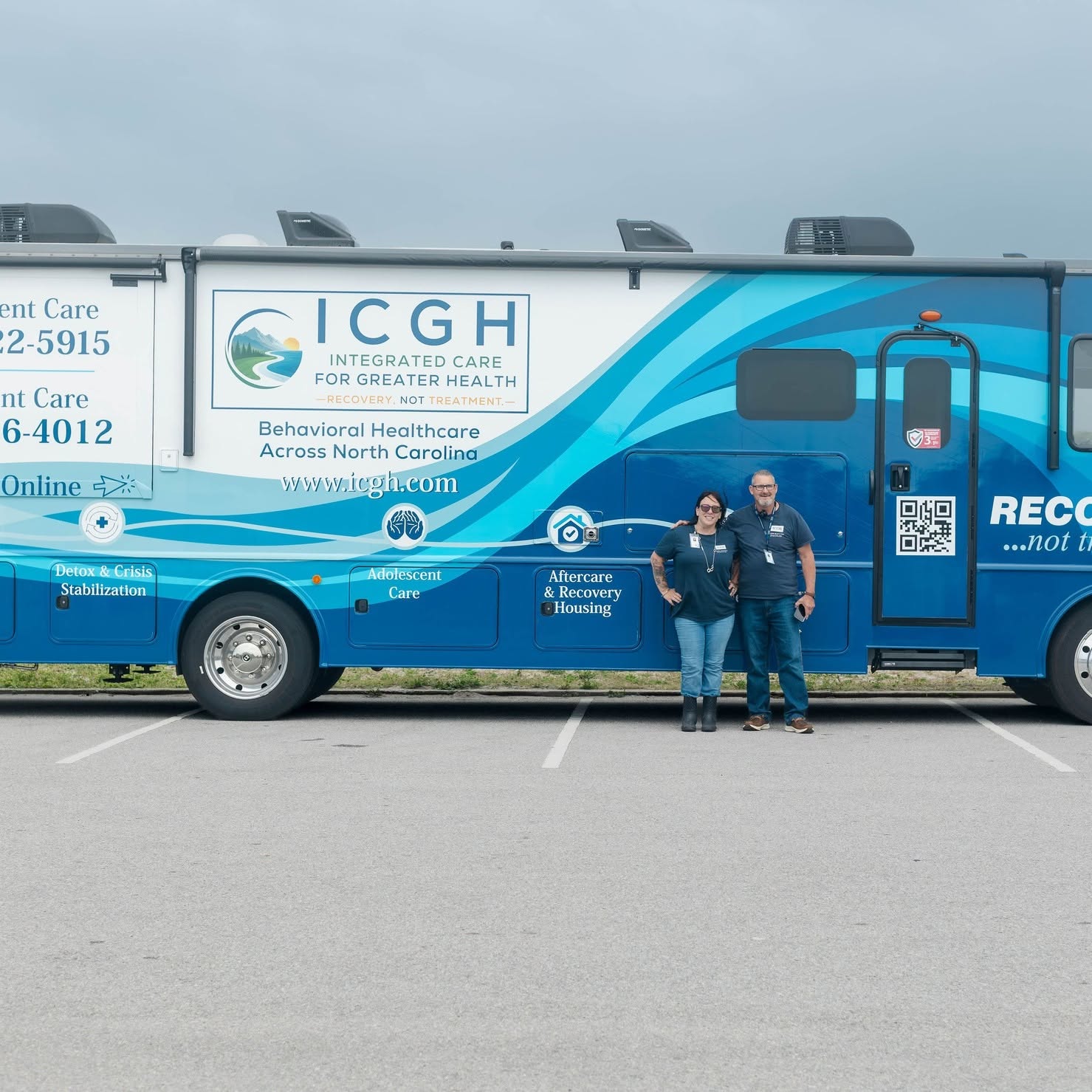 ICGH team standing beside the mobile integrated care unit