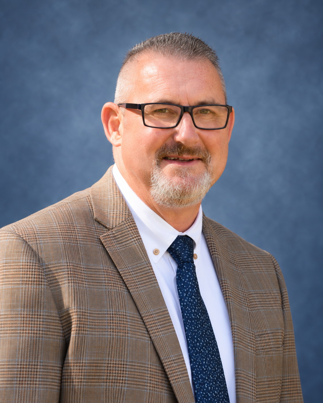 L. Wayne McMeans, gerente de sede de Dobson y formador de especialistas en acercamiento comunitario